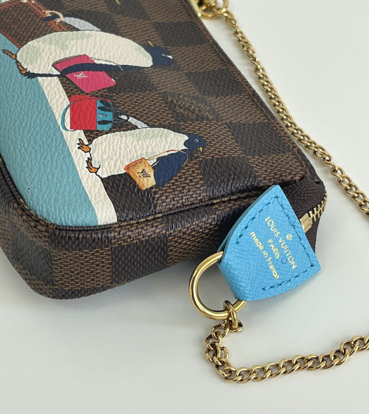 Louis Vuitton penguin holiday mini pochette – Lady Clara's Collection