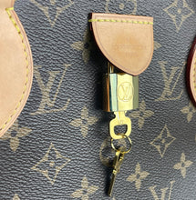Load image into Gallery viewer, Louis Vuitton Rivoli MM in monogram