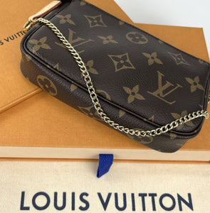 Louis Vuitton mini pochette accessories in monogram canvas