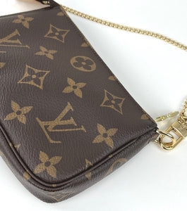 Louis Vuitton mini pochette accessories in monogram canvas