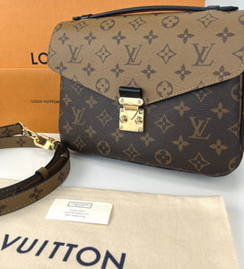 Louis Vuitton pochette metis in monogram reverse canvas