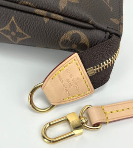 Louis Vuitton pochette accessories in monogram