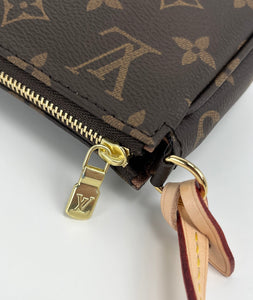 Louis Vuitton pochette accessories in monogram