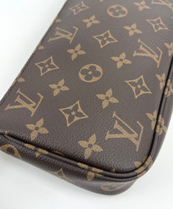 Louis Vuitton pochette accessories in monogram