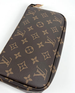 Louis Vuitton pochette accessories in monogram