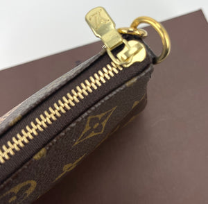 Louis Vuitton mini pochette trunks&bags