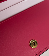 Load image into Gallery viewer, Gucci GG small wallet in fuchsia matelasse leather