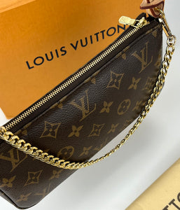 Louis Vuitton pochette accessories in monogram