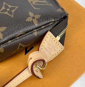 Louis Vuitton pochette accessories in monogram