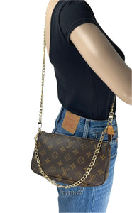 Louis Vuitton pochette accessories in monogram