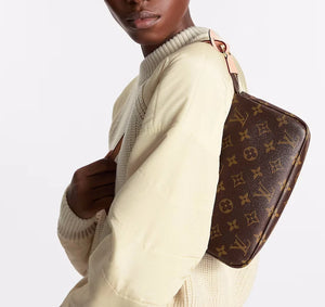 Louis Vuitton pochette accessories in monogram