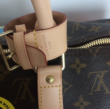 Load image into Gallery viewer, Louis Vuitton World tour keepall bandouliere 50