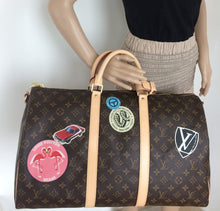 Load image into Gallery viewer, Louis Vuitton World tour keepall bandouliere 50
