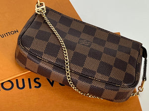Louis Vuitton mini pochette in damier ebene