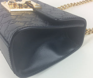 Gucci small signature padlock bag