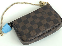 Load image into Gallery viewer, Louis Vuitton penguin holiday mini pochette