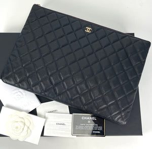 Chanel Classic pouch in black grained shiny calfskin