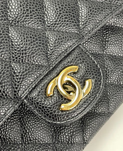 Chanel classic medium double flap in black caviar