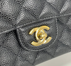 Chanel classic medium double flap in black caviar