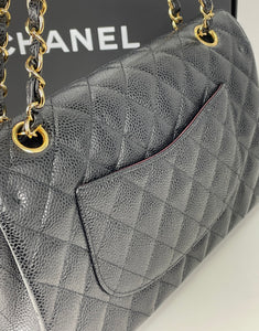 Chanel classic medium double flap in black caviar