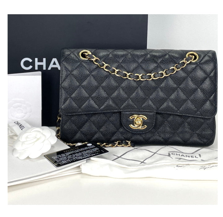 Chanel classic medium double flap in black caviar