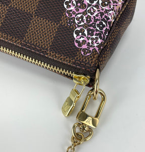 Louis Vuitton Vivienne holiday mini pochette