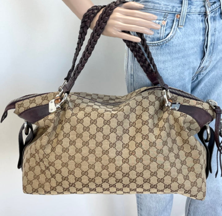 Gucci braided store handle bag