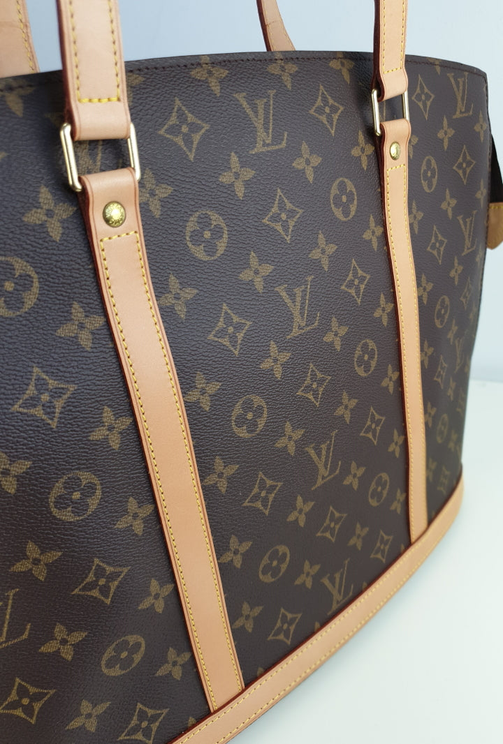 The vintage Louis Vuitton Babylone really does the trick for a laptop