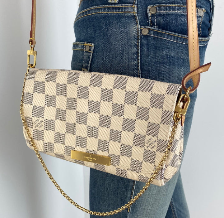 WHAT 2 WEAR of SWFL - Just in Louis Vuitton Favorite PM Azur. Sold Out!  Always authentic guaranteed! Direct message (not in the comments) for  price. Or better yet, stop in and